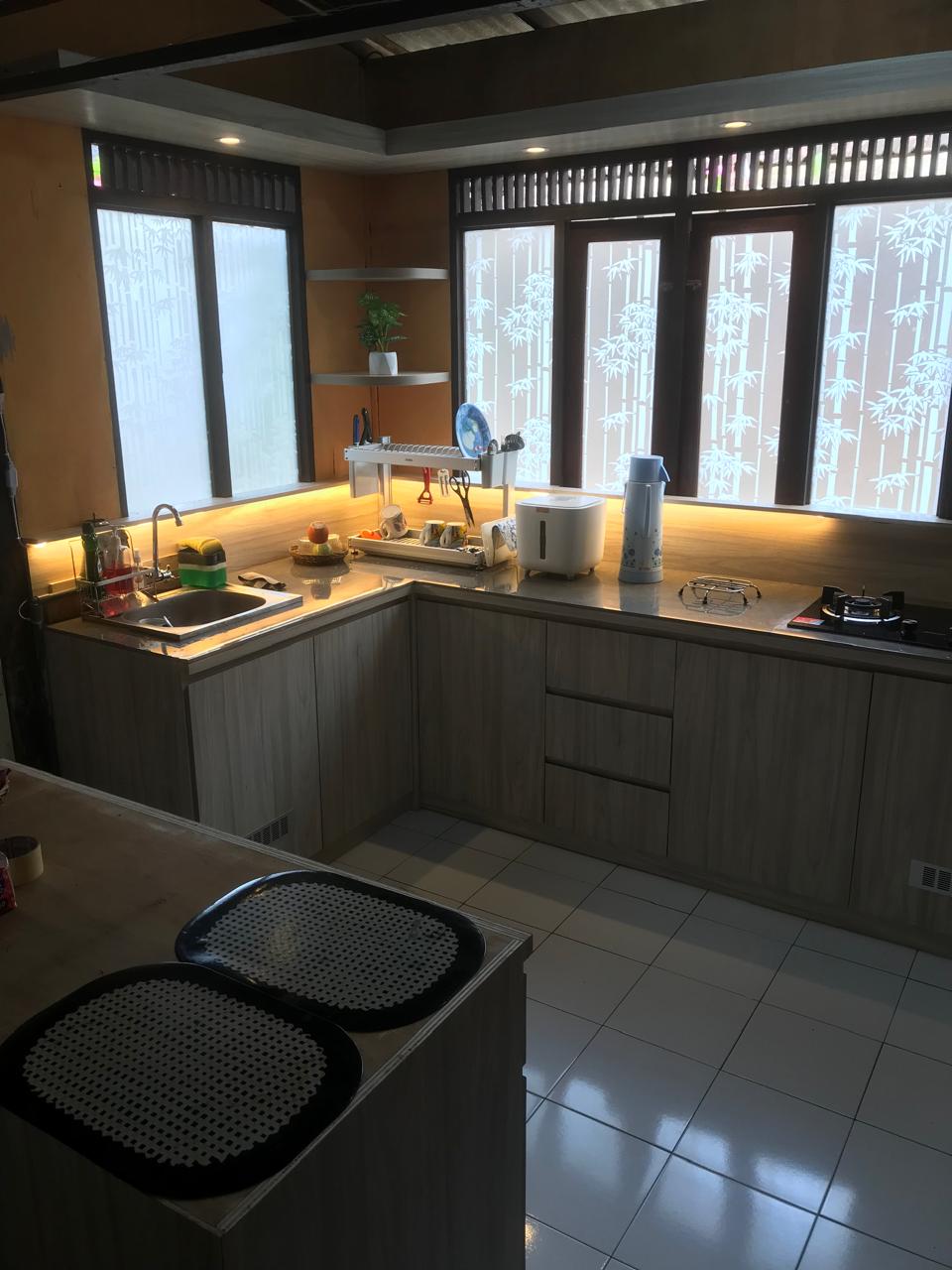 Modern living room set featuring sofa, coffee table and bookshelves